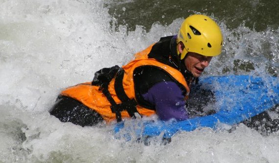 Downhill swimming in white water Aude